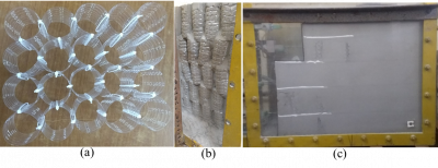 Multi-tiered fly ash wall reinforced with waste plastic bottle geocell